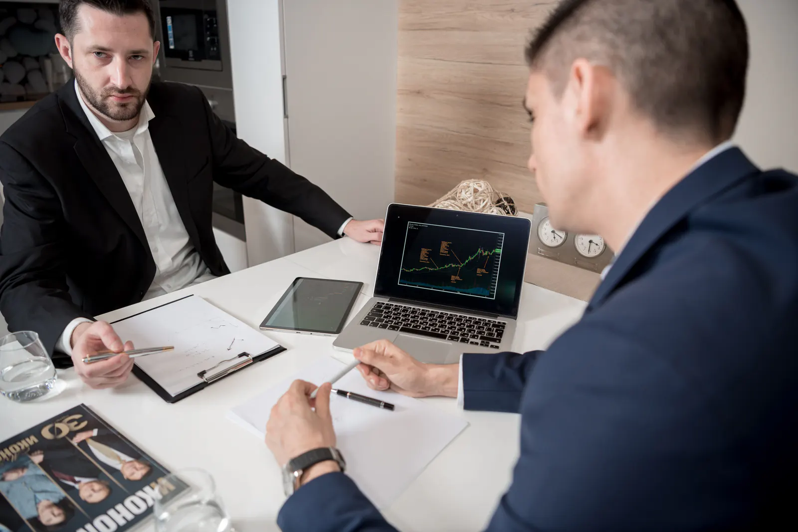 Business consultants reviewing performance data during a meeting