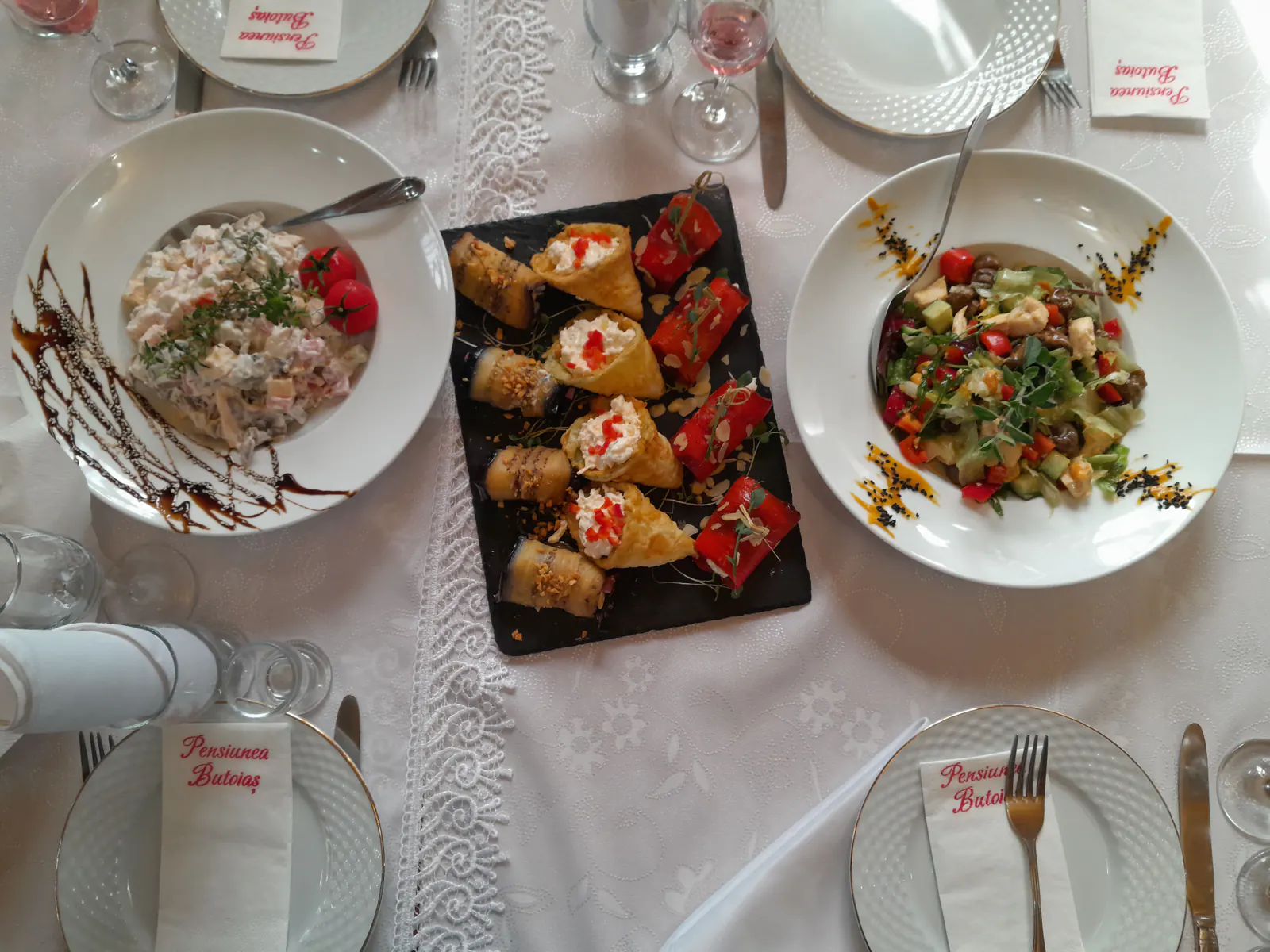Catered salads and appetizers arranged for an event