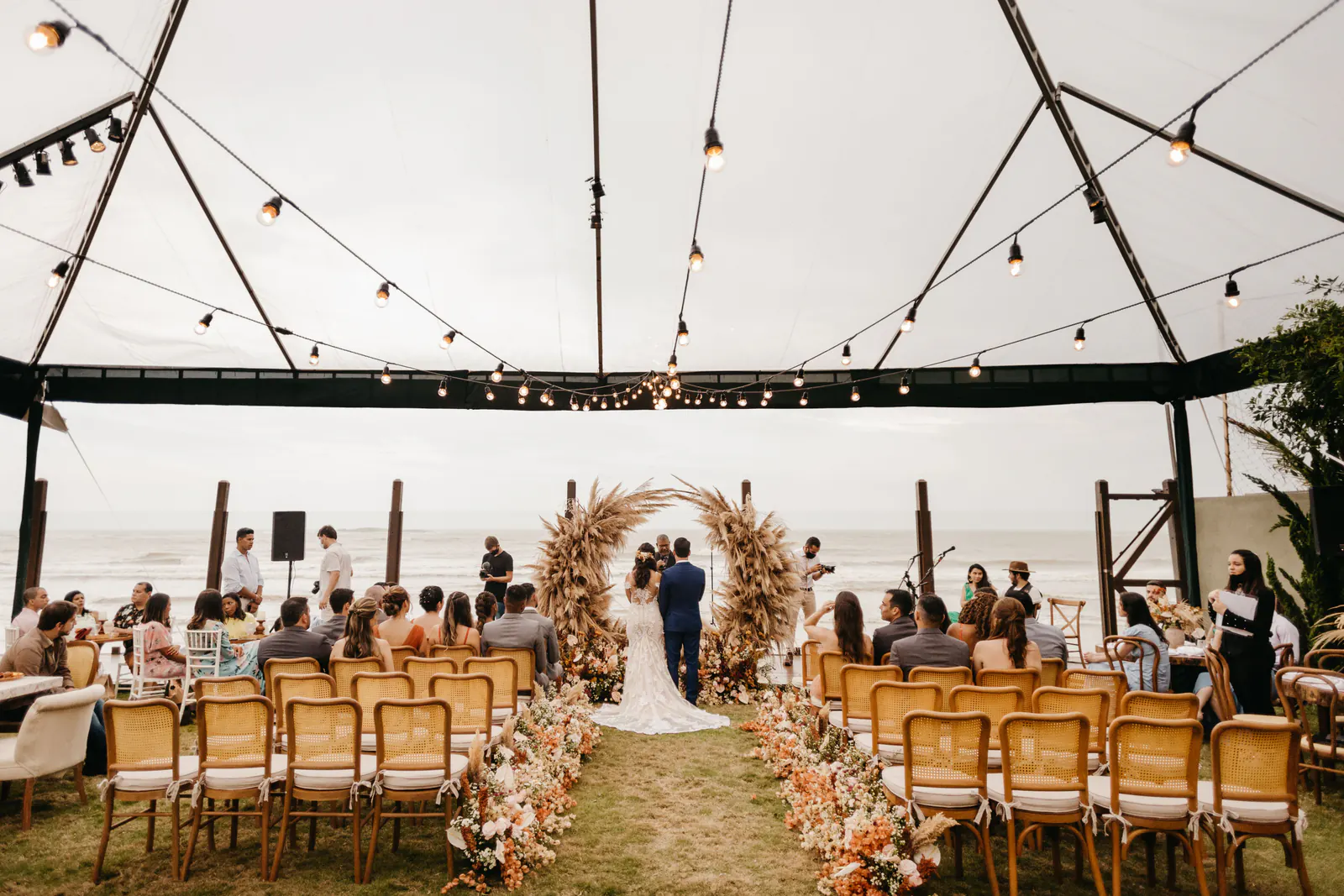 Outdoor wedding ceremony at a waterfront venue